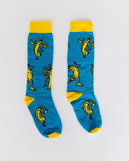 Blue socks with yellow accents and banana pattern on a white background
