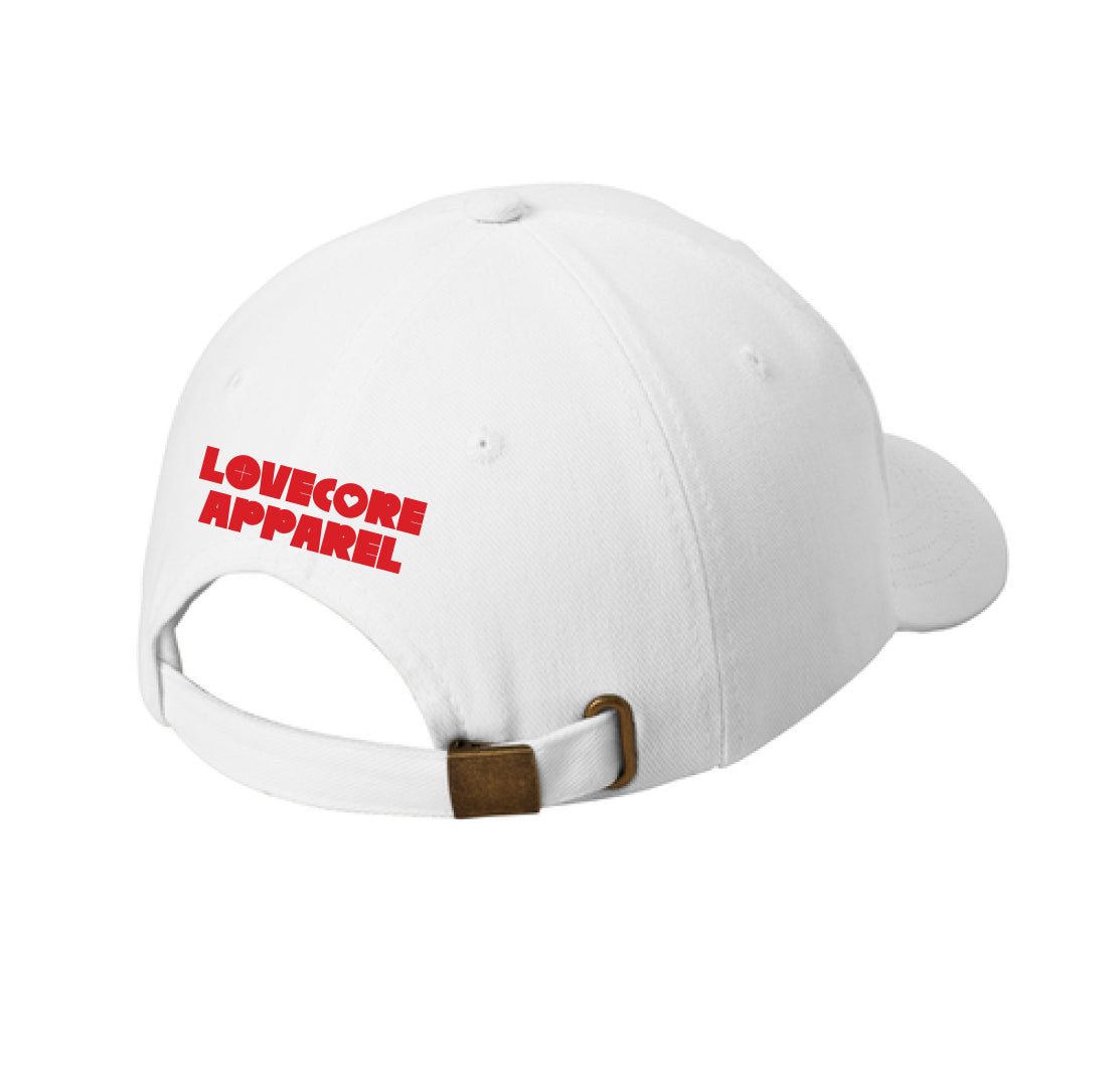 White cap with 'LOVECORE APPAREL' text in red on a white background